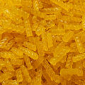 Close-up of yellow hard boiled lollies 