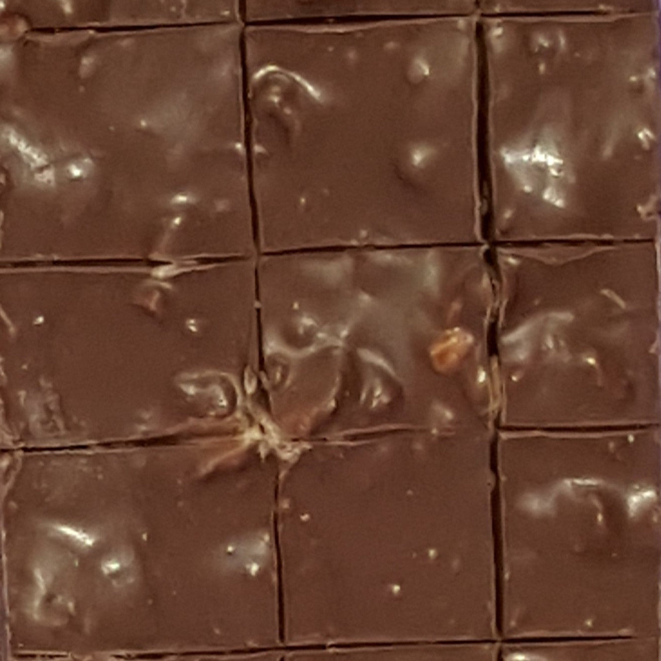 Close-up of chocolate bar cut into squares