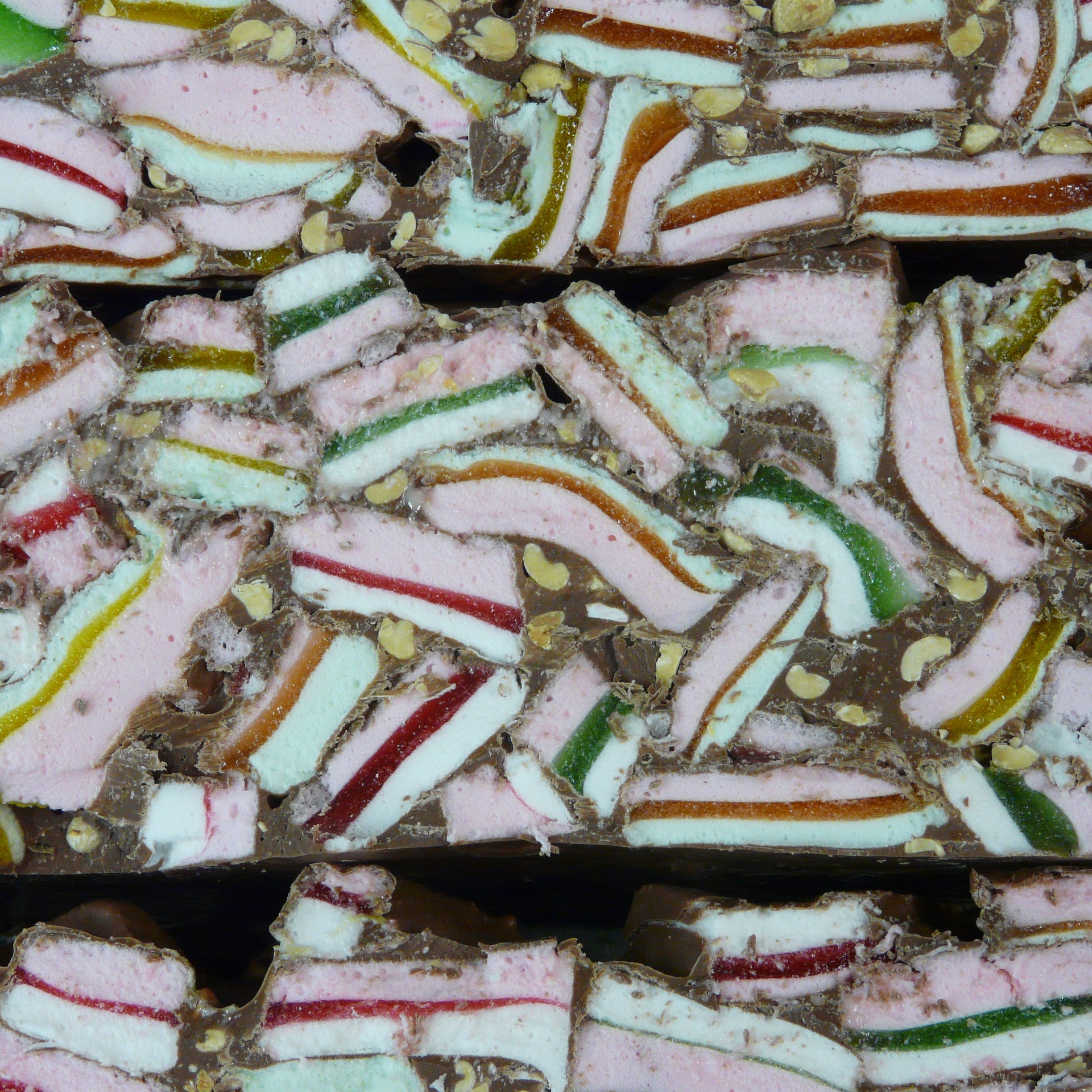 Colorful licorice candy pieces arranged in a pattern
