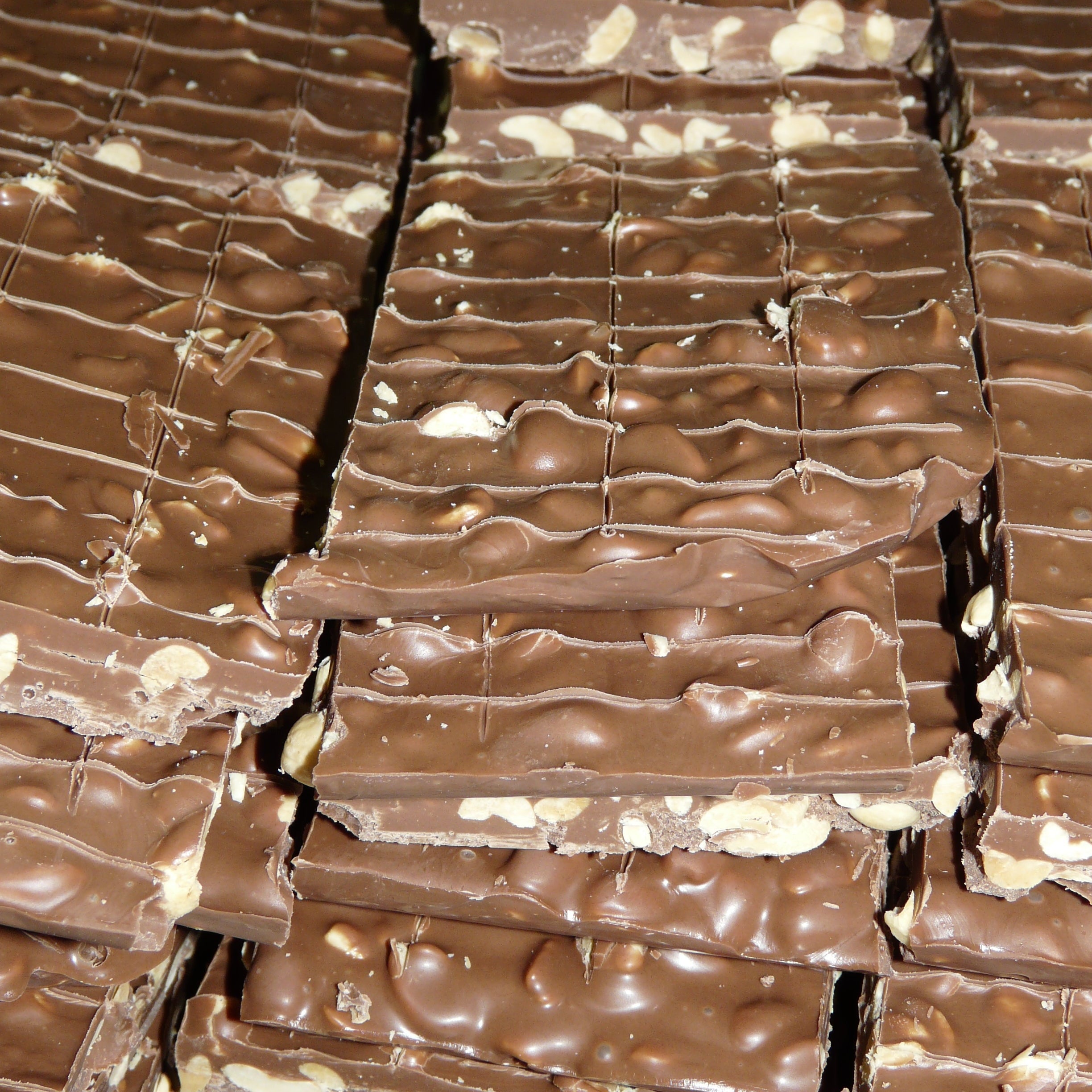 Stack of chocolate bars with a wavy pattern