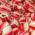 Close-up of red and white striped candies