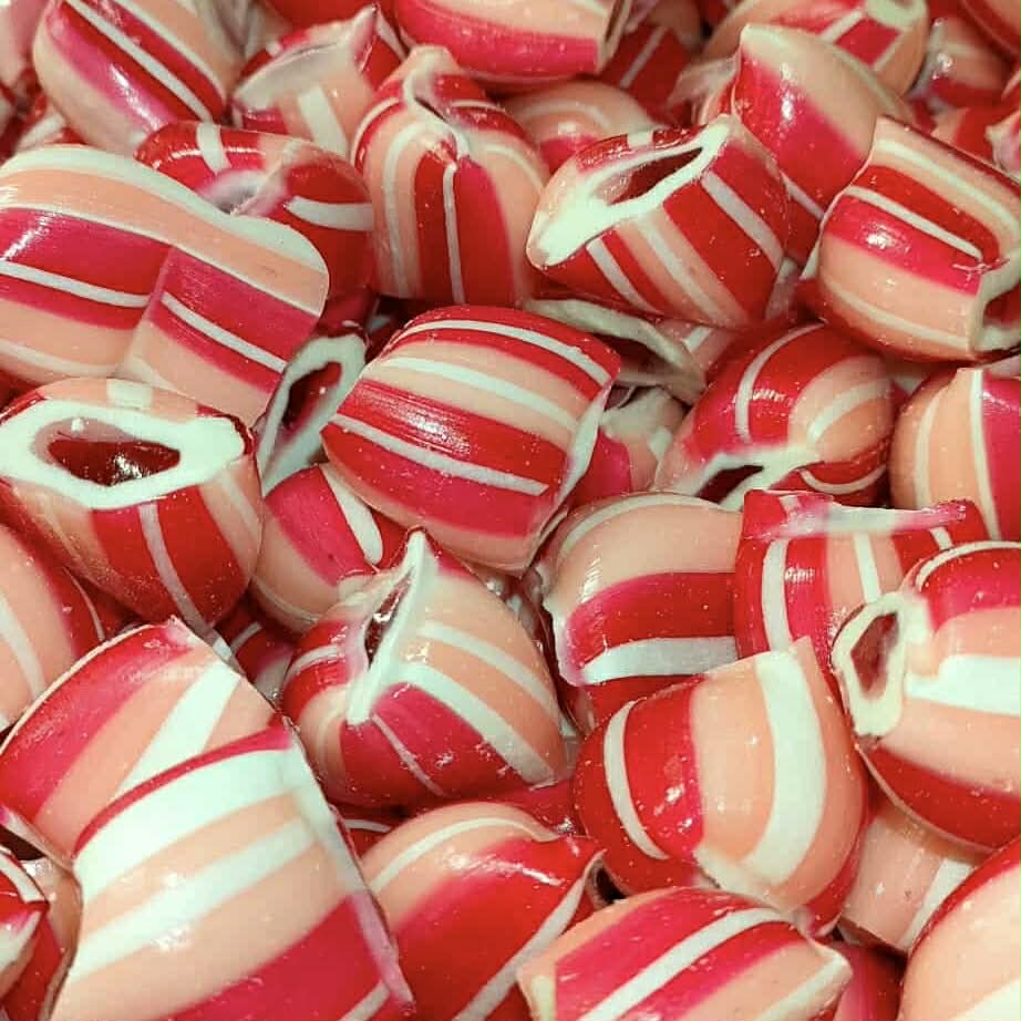 Close-up of red and white striped candies